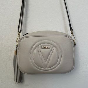 Beautiful Valentino hand crossbody bag in cream beige color